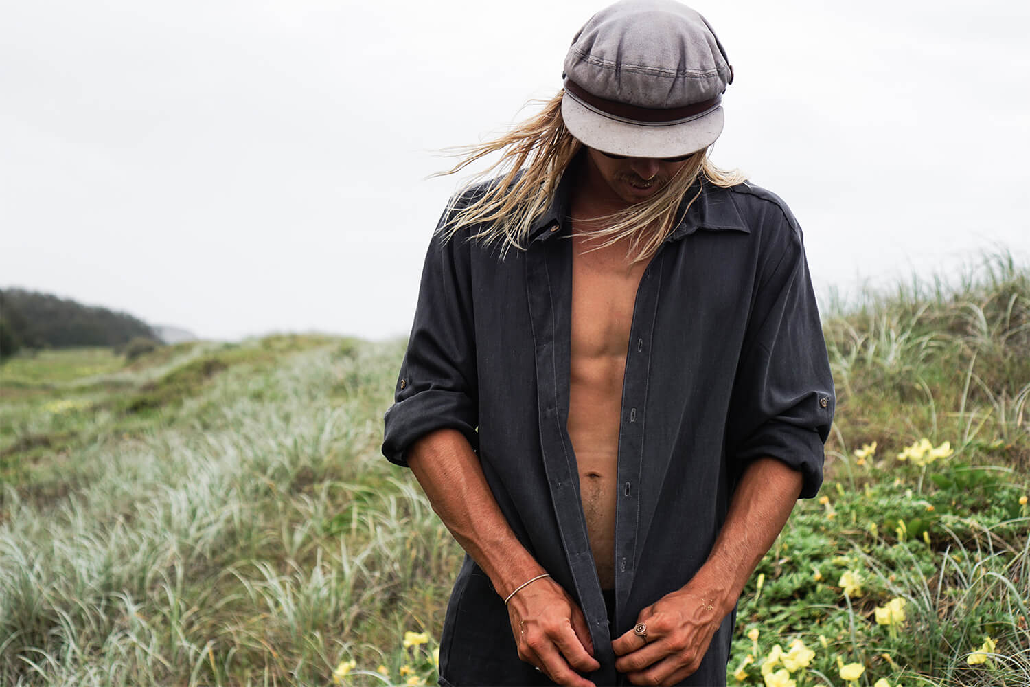 Tasi Travels' Men's Charcoal Long-Sleeve Voyager Shirt is handmade from sustainable Tencel