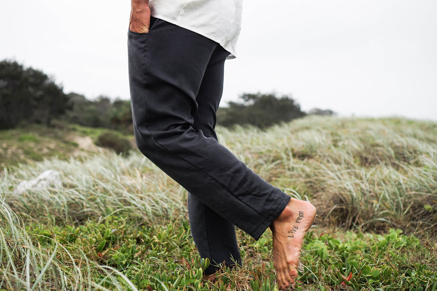 Tasi Travels' Men's Charcoal Roamer Pants are handmade from a sustainable Tencel & hemp blend