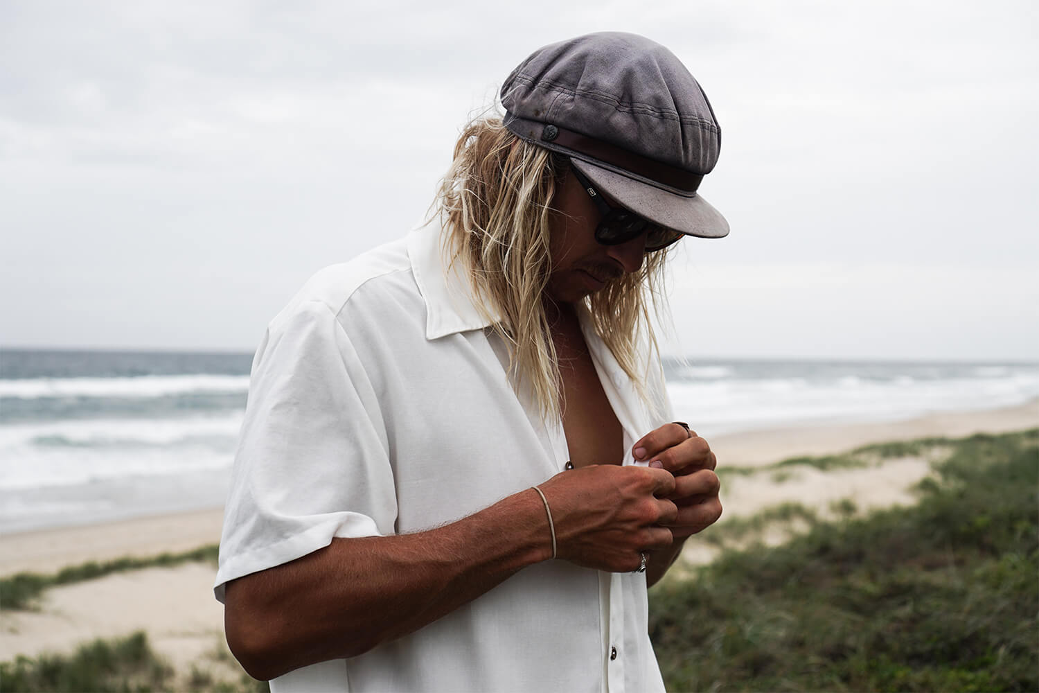 Tasi Travels' Men's White Short-Sleeve Voyager Shirt is handmade from a sustainable Tencel & hemp blend