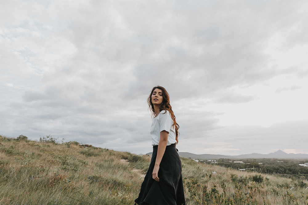 Tasi Travels' Black Wilder Wrap Skirt is handmade in Australia from sustainable Tencel