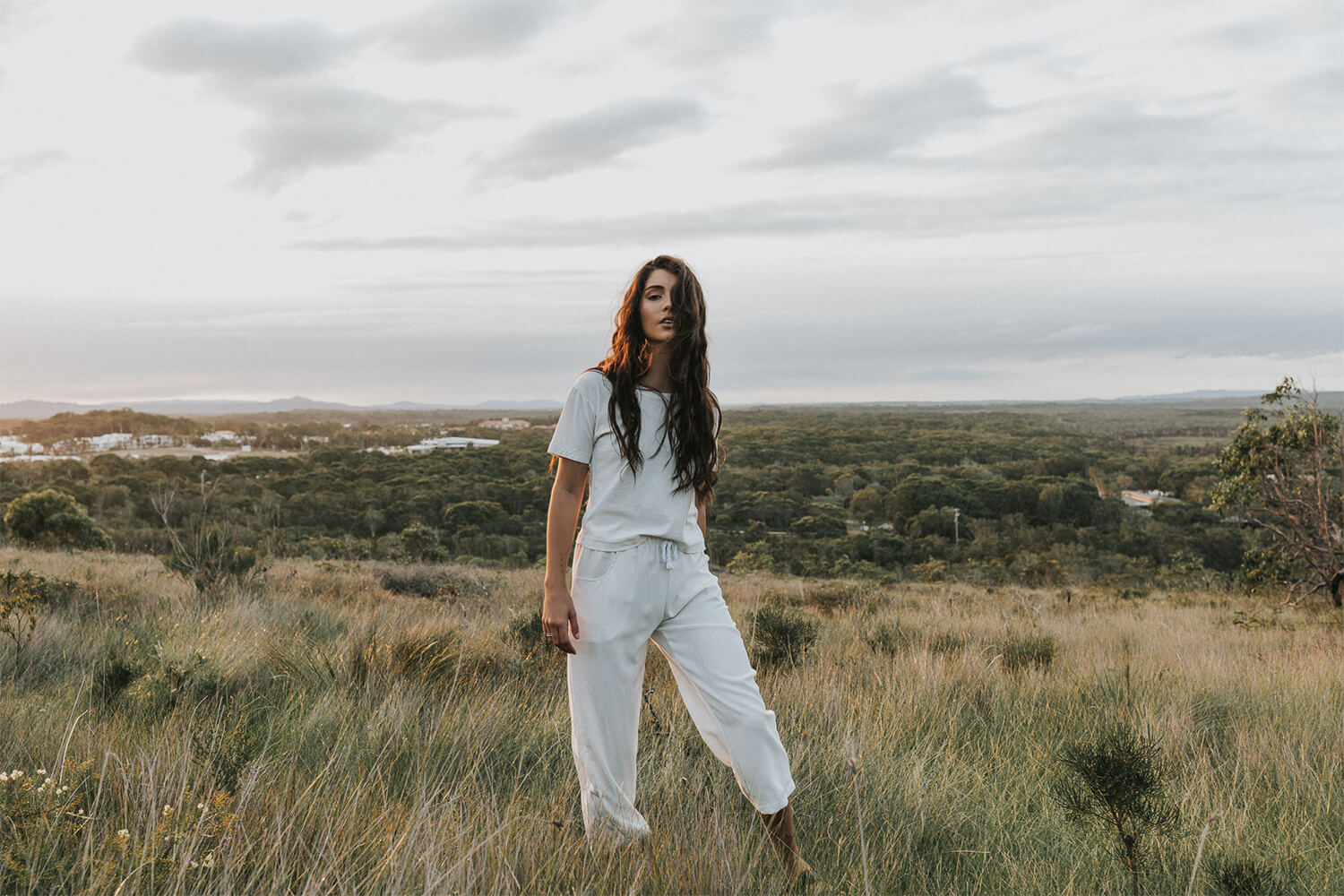 Tasi Travels' Women's White Roamer Pants are handmade from sustainable Tencel